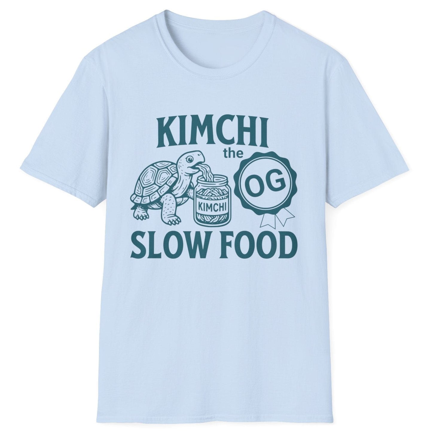 Retro-style line art illustration of a tortoise eating kimchi from an open jar, printed on a light blue fermentation T-shirt with the words 'Kimchi The OG Slow Food. Great gift for fermenters.