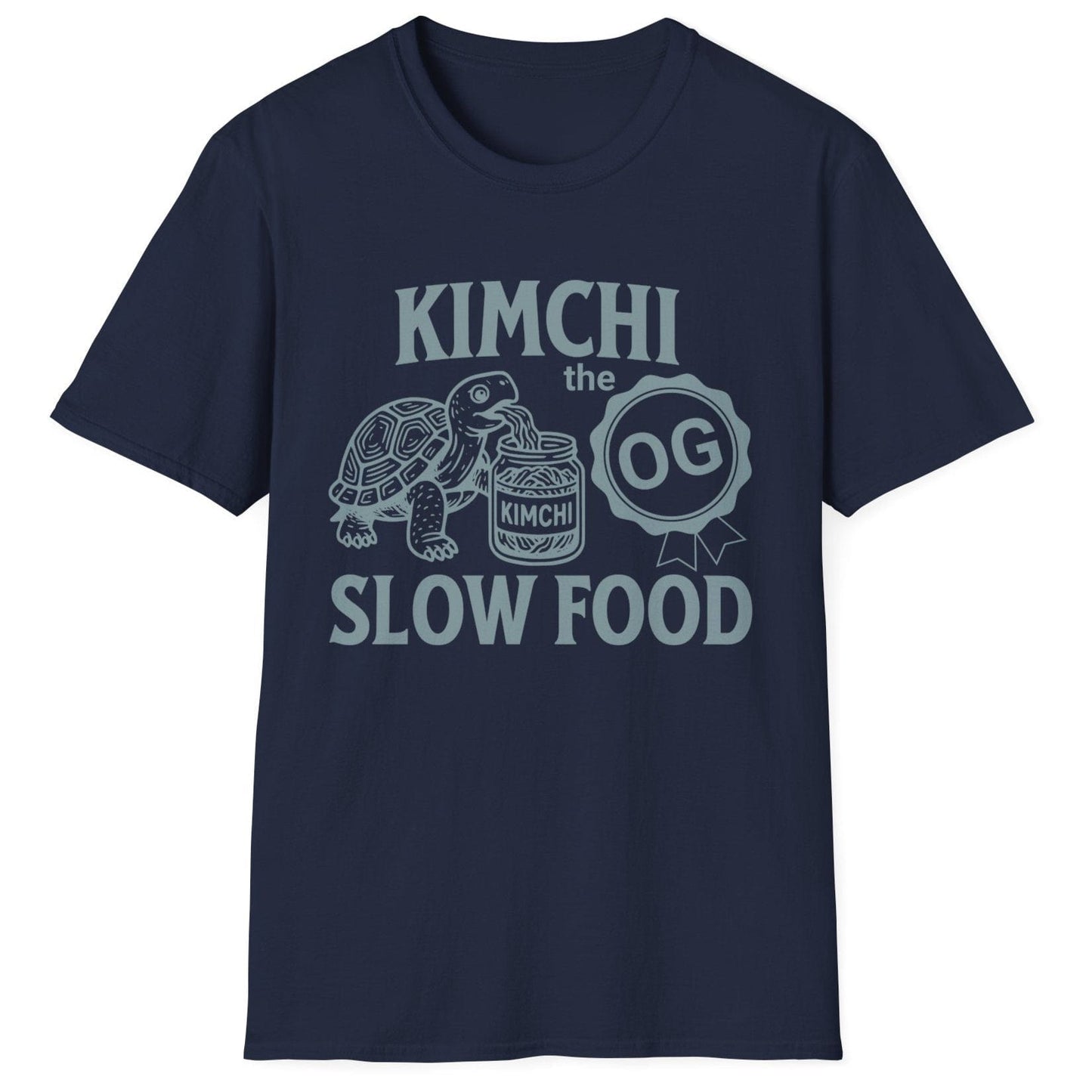 Retro-style line art illustration of a tortoise eating kimchi from an open jar, printed on a navy fermentation T-shirt with the words 'Kimchi The OG Slow Food. Great gift for fermenters.