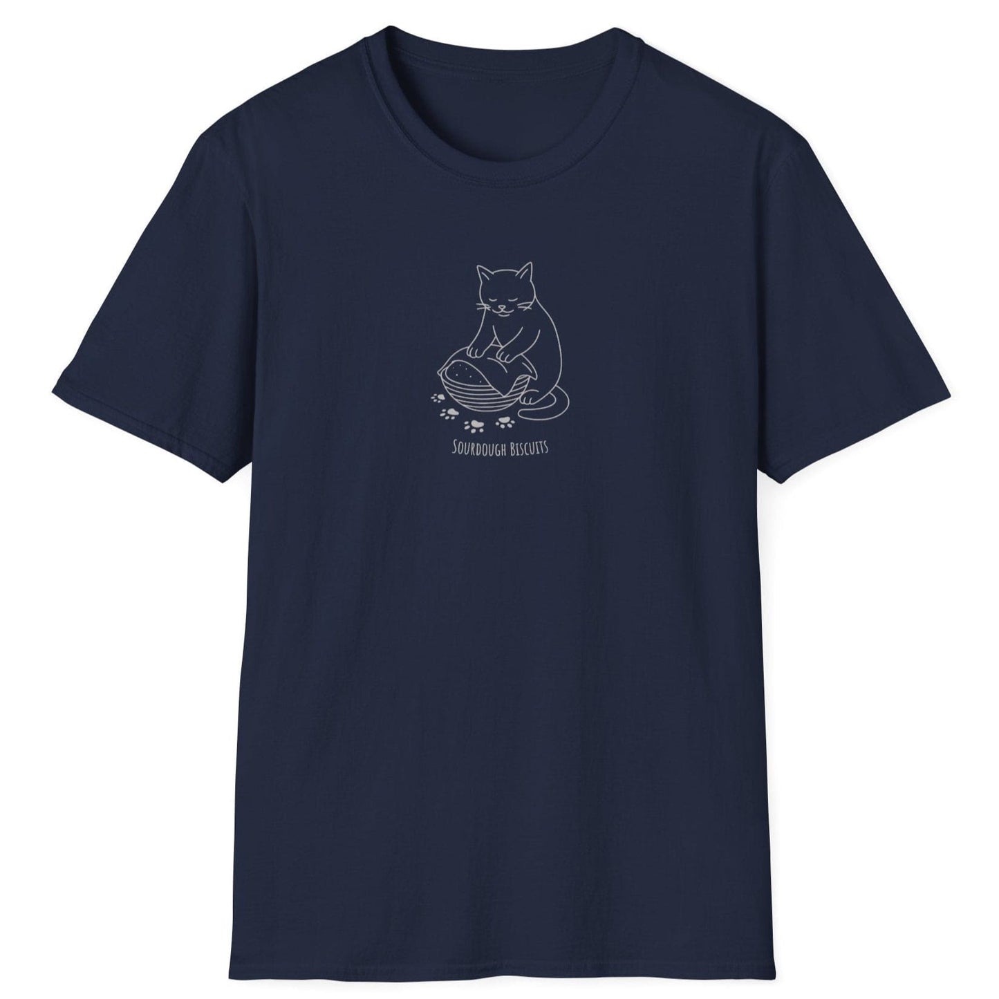 Illustrated cat kneading dough in a banneton, surrounded by floury paw prints — Sourdough Biscuits t-shirt in navy for cat and bread lovers