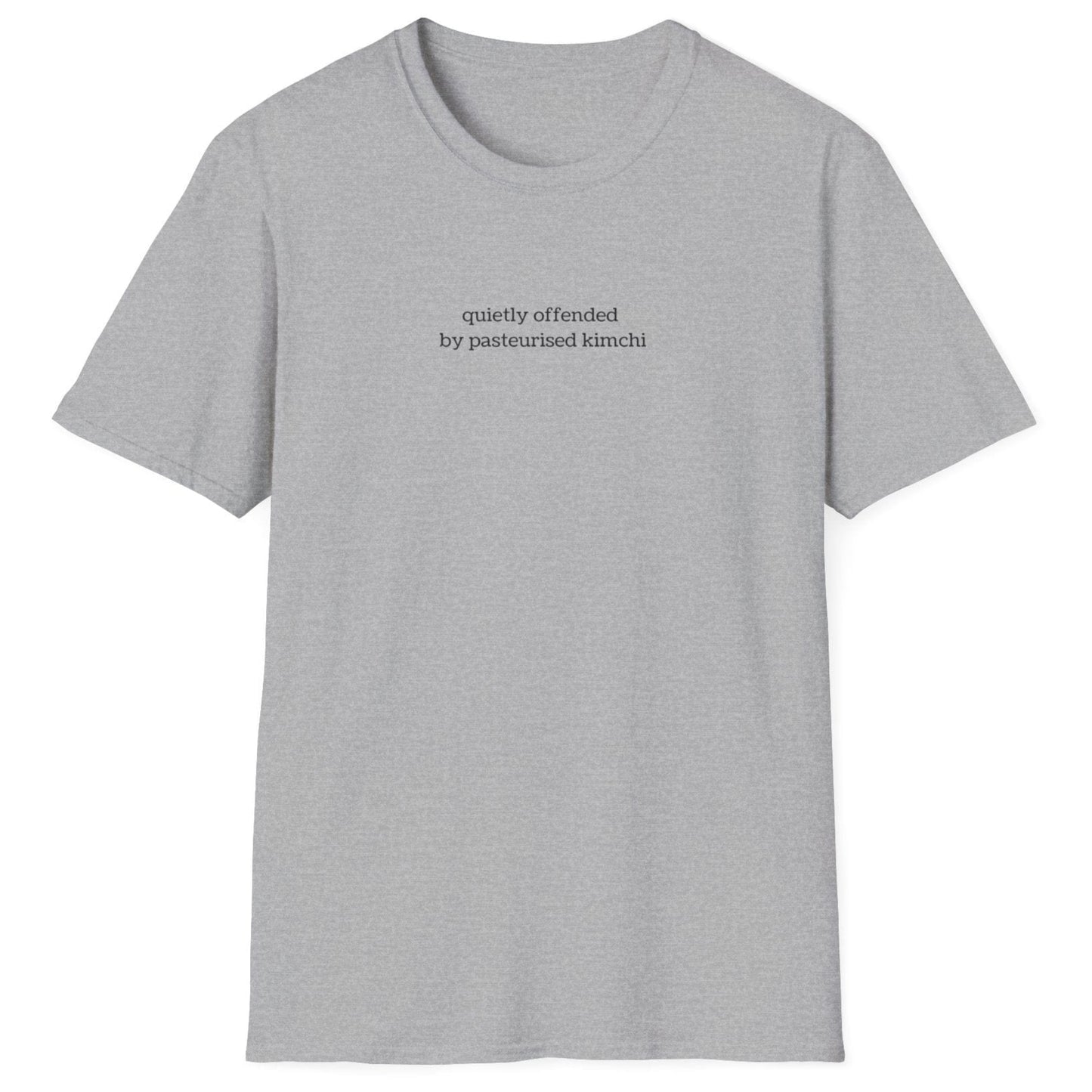 Minimalist grey t-shirt with lowercase black text reading “quietly offended by pasteurised kimchi” — subtle tee for wild fermenters and cultured food fans.
