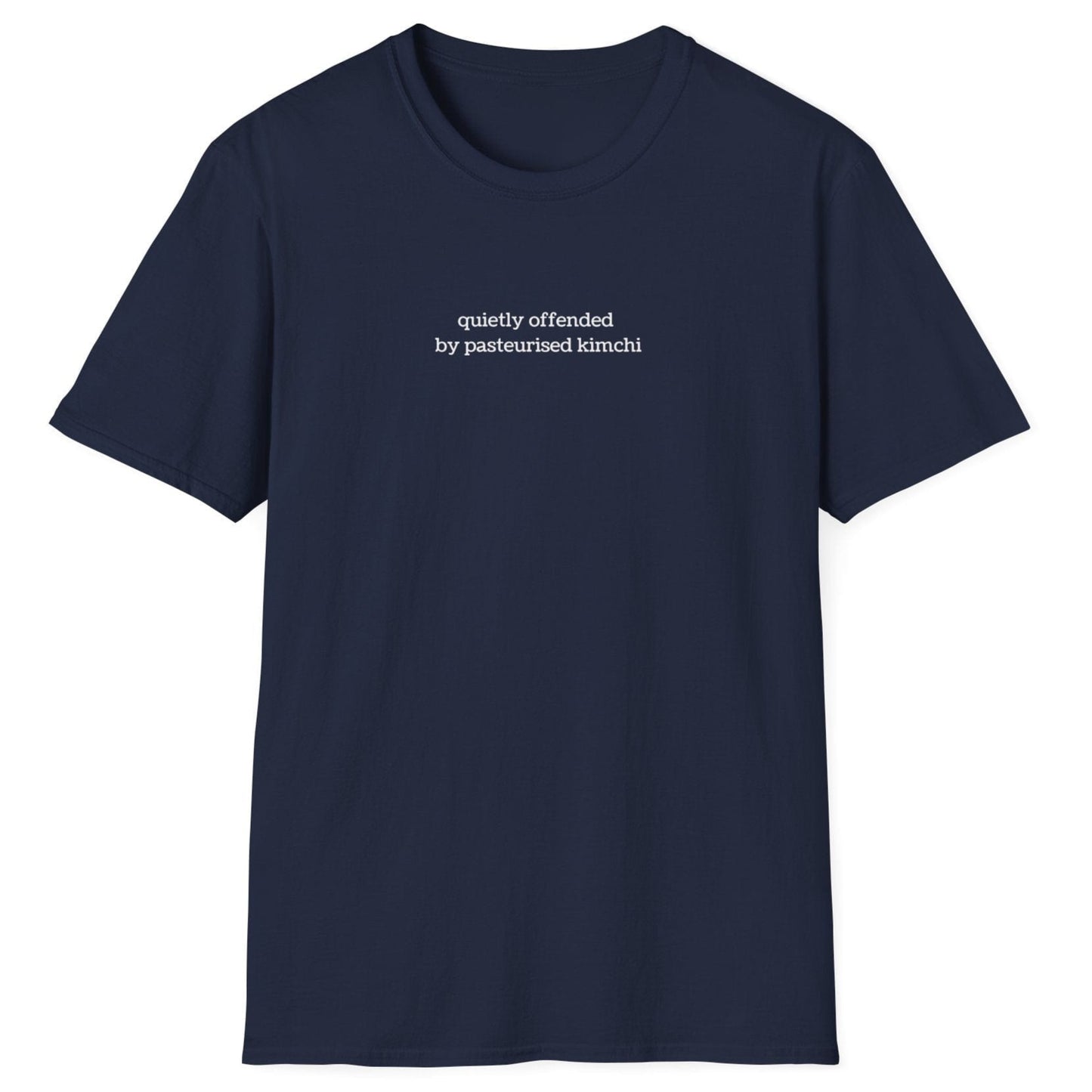 Minimalist navy t-shirt with lowercase white text reading “quietly offended by pasteurised kimchi” — subtle tee for wild fermenters and cultured food fans.