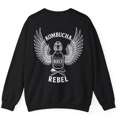 Black Kombucha Rebel back print sweatshirt for fans of fermentation, featuring a bottle of booch with dramatic wings and crossed spoons - one with tea leaves and one with sugar. Design inspired by vintage Harley Davidson jackets.