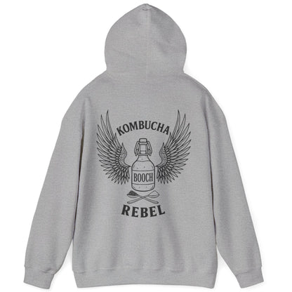 Grey Kombucha Rebel back print hoodie for fans of fermentation, featuring a bottle of booch with dramatic wings and crossed spoons - one with tea leaves and one with sugar. Design inspired by vintage Harley Davidson jackets.