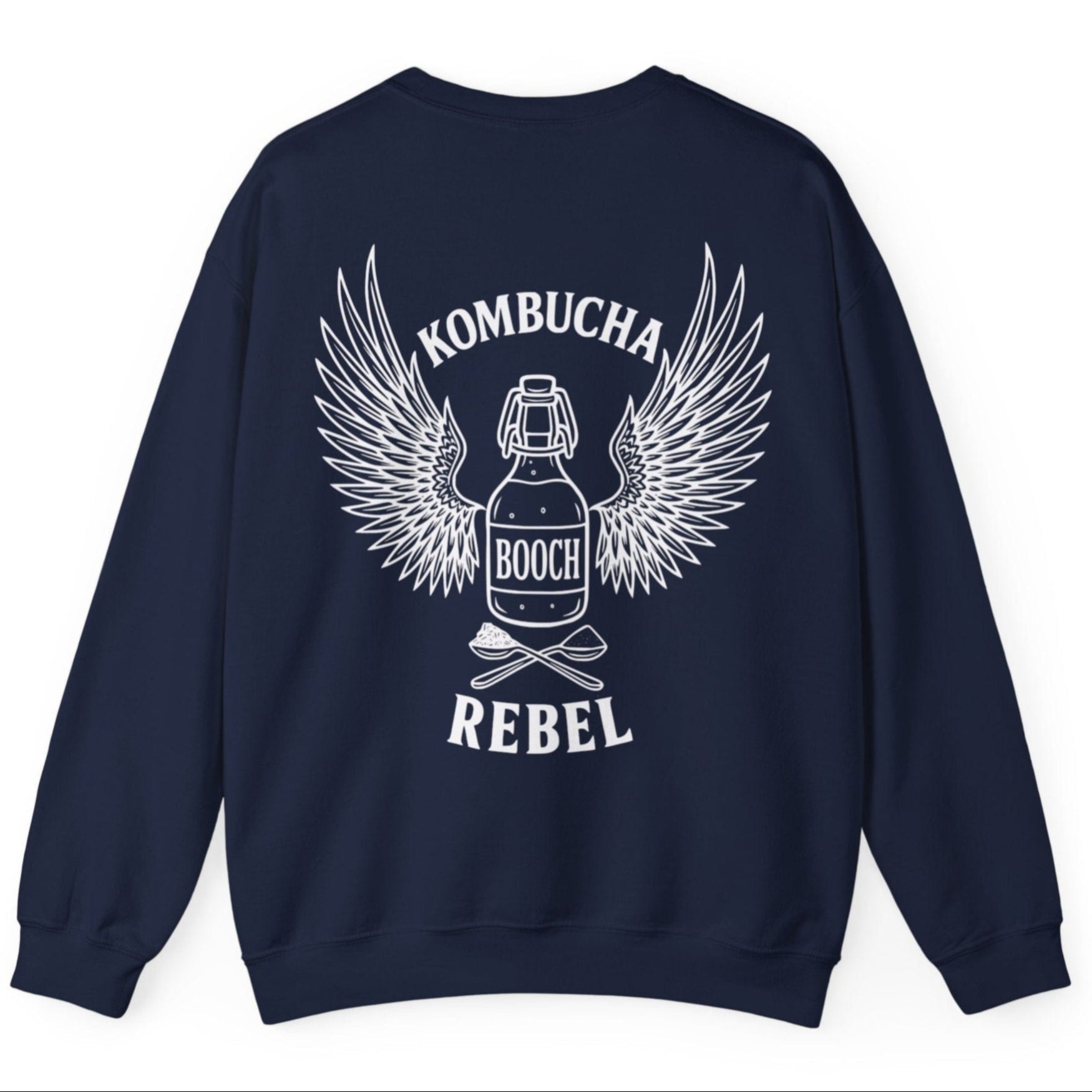 Navy Kombucha Rebel back print sweatshirt for fans of fermentation, featuring a bottle of booch with dramatic wings and crossed spoons - one with tea leaves and one with sugar. Design inspired by vintage Harley Davidson jackets.