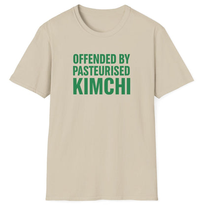 Bold neutral t-shirt with the slogan “Offended by Pasteurised Kimchi” in blocky 90s-style typography — perfect for fermentation lovers, kimchi purists, and probiotic advocates.