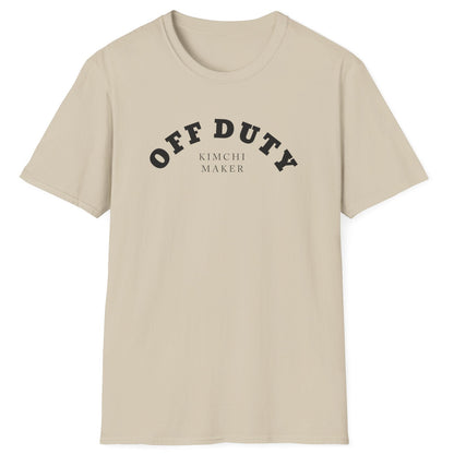 Off Duty Kimchi Maker sand cotton T-shirt with minimal arched typography design, perfect for kimchi fans and fermentation lovers.