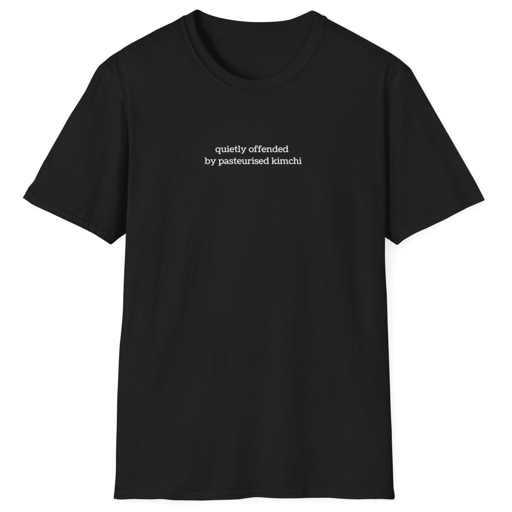 Minimalist black t-shirt with lowercase white text reading “quietly offended by pasteurised kimchi” — subtle tee for wild fermenters and cultured food fans.