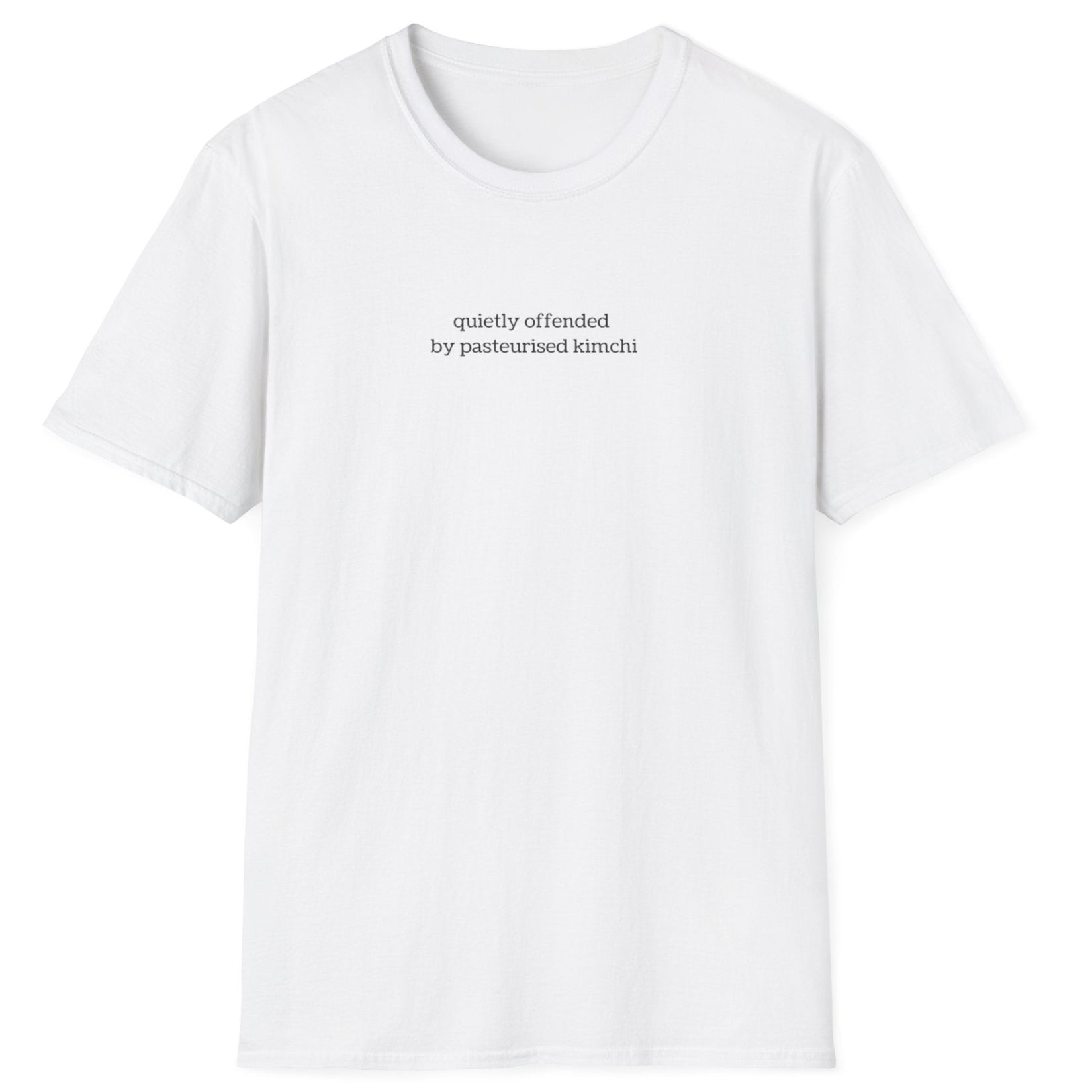 Minimalist white t-shirt with lowercase black text reading “quietly offended by pasteurised kimchi” — subtle tee for wild fermenters and cultured food fans.
