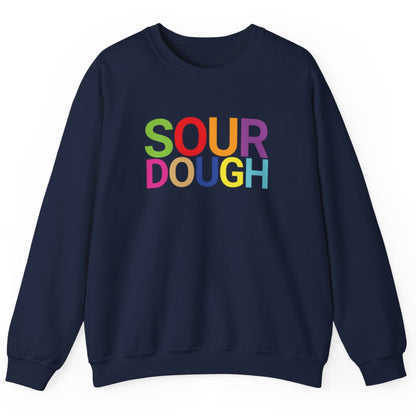 Navy blue sweatshirt with the word 'SOURDOUGH'' in bold colourful typography. Great gift for fermenters and sourdough bakers.